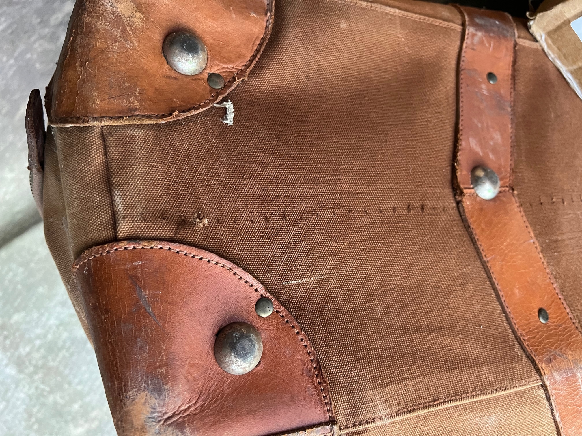 Vintage canvas cricket bag. Typical use of domed base studs.