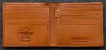 In Stock:
Yes
Tudor East West Basal Wallet in tam Leather